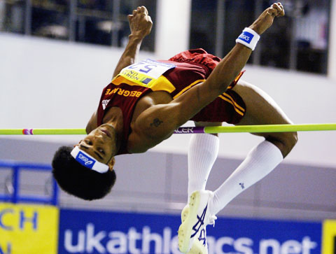 Ben Challenger jumping over the bar